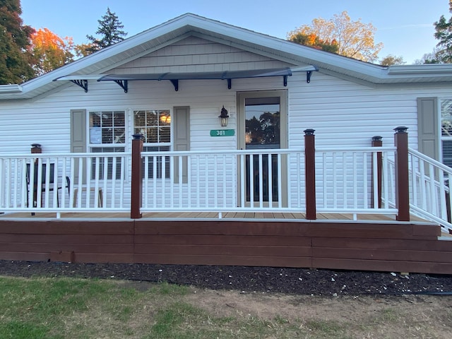 rear view of house with a deck