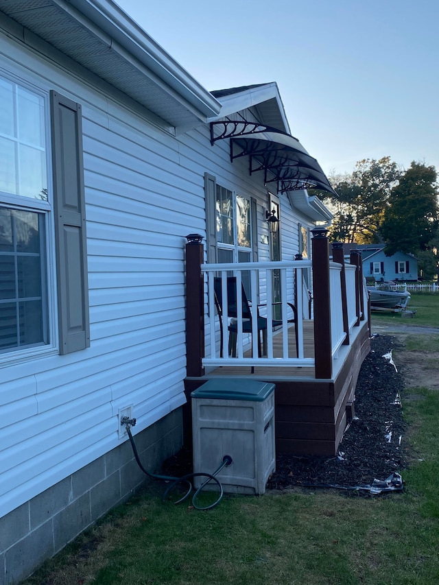 view of home's exterior with a yard