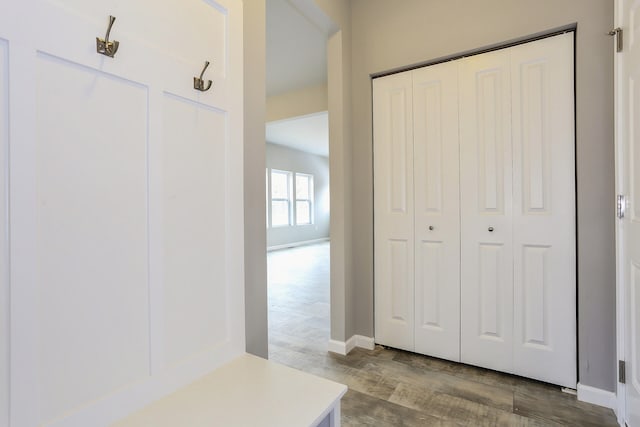 mudroom with hardwood / wood-style floors