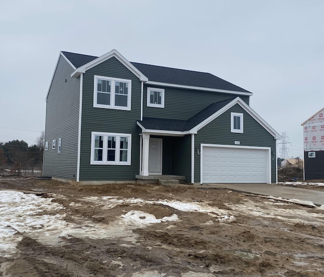 view of front property with a garage