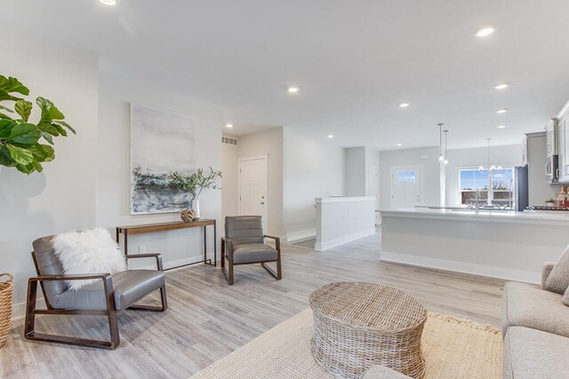 living room featuring light wood-type flooring