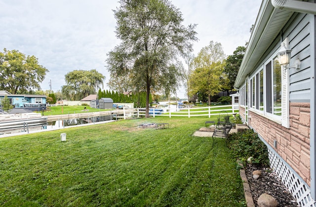 view of yard featuring a water view