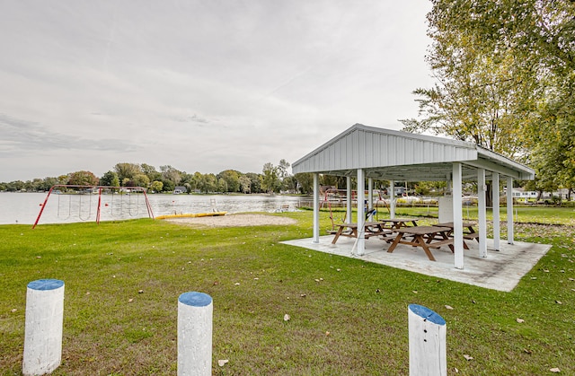 view of yard featuring a gazebo and a water view