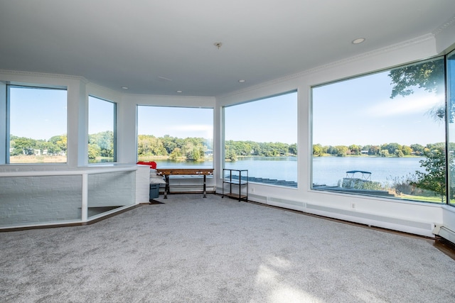 sunroom / solarium with a water view