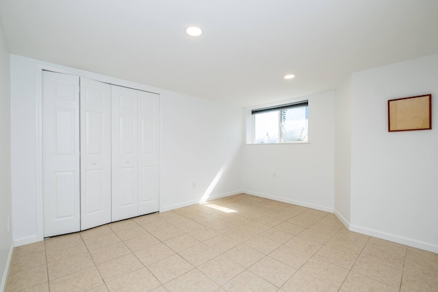 unfurnished bedroom featuring a closet