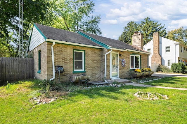 view of front of home with a front yard