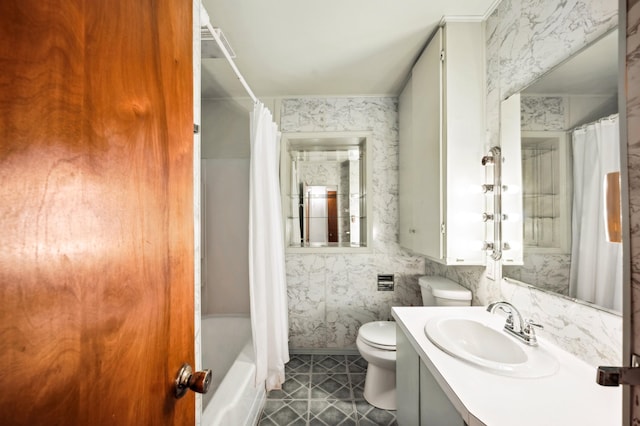 full bathroom with shower / bath combination with curtain, vanity, toilet, and tile patterned floors