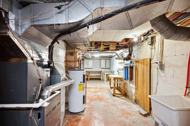 basement featuring water heater and sink