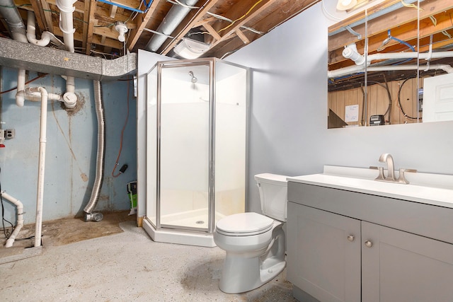 bathroom with vanity, walk in shower, and toilet