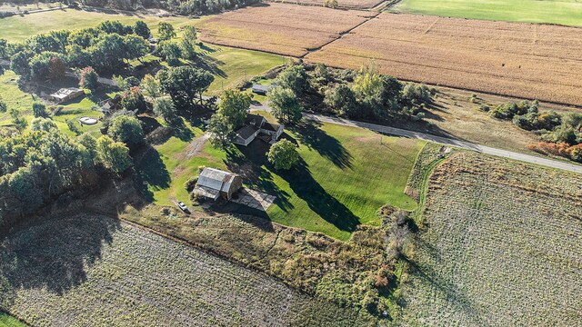 birds eye view of property featuring a rural view