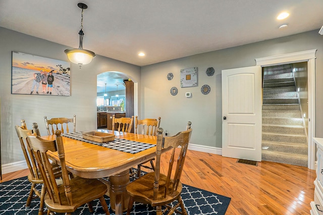 dining space with light wood-type flooring