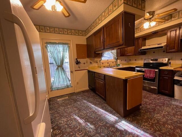 kitchen featuring black dishwasher, tasteful backsplash, electric stove, white fridge, and ventilation hood