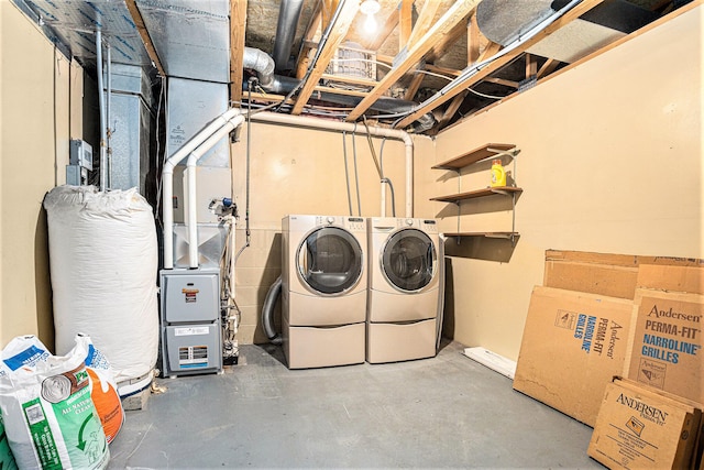 washroom with independent washer and dryer