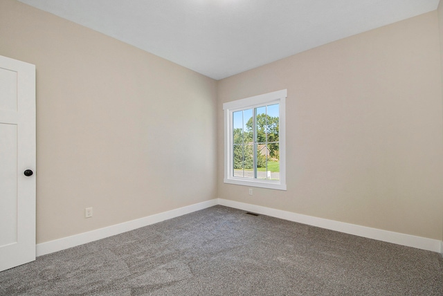 empty room featuring carpet flooring