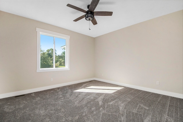 carpeted empty room with ceiling fan