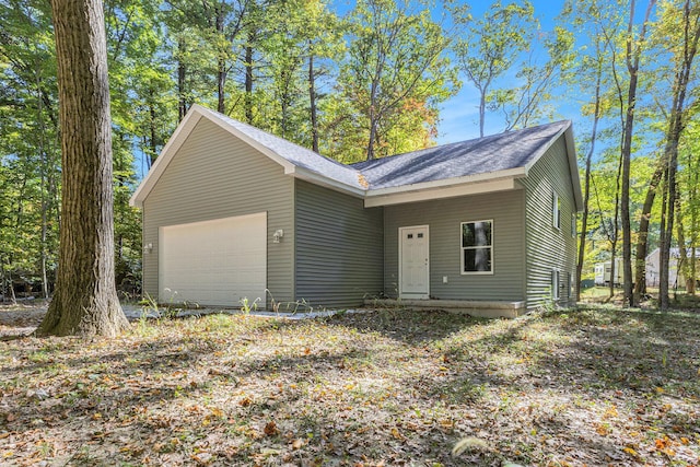 single story home featuring a garage