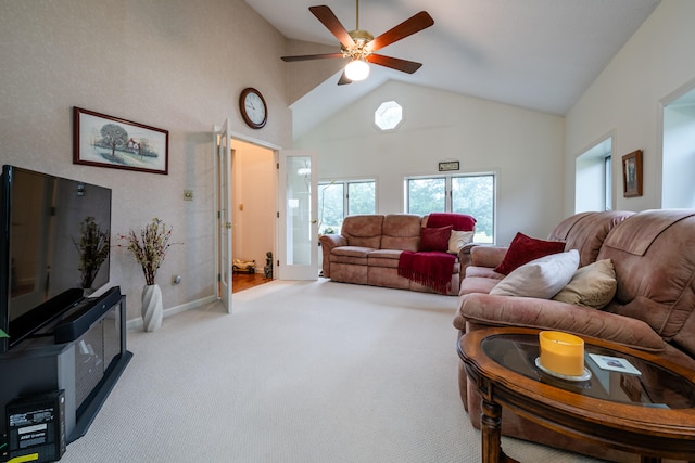 carpeted living room featuring high vaulted ceiling and ceiling fan