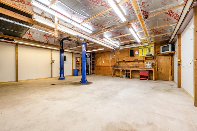 basement with a workshop area