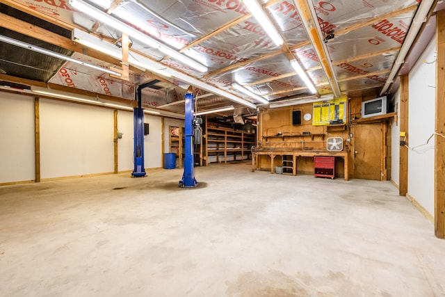 basement with a workshop area