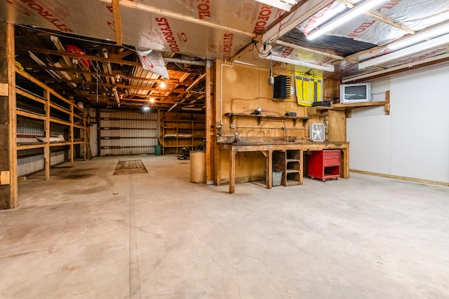 basement with a workshop area