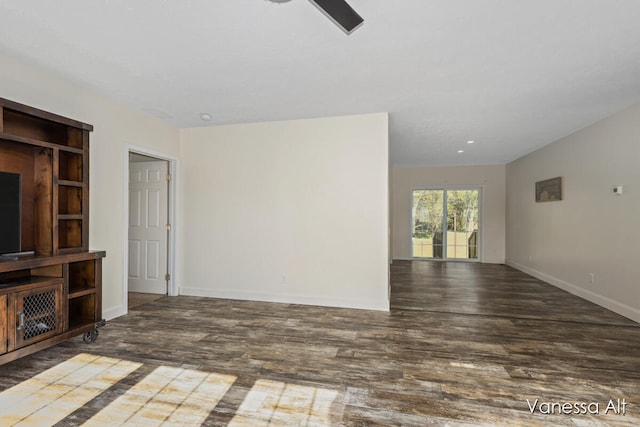 unfurnished living room featuring dark wood-type flooring