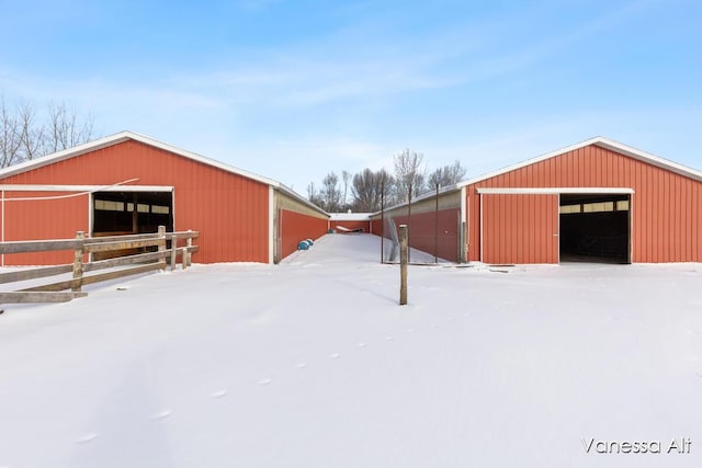 yard covered in snow with an outdoor structure