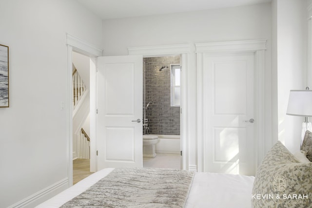 bedroom featuring ensuite bathroom