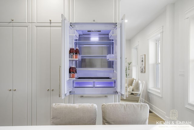 interior details featuring fridge