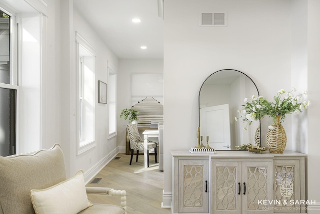 corridor featuring light hardwood / wood-style flooring