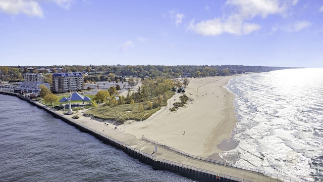 aerial view featuring a view of the beach and a water view