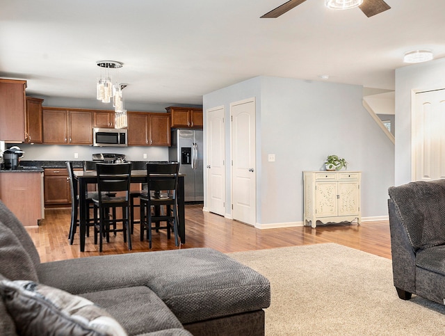 interior space featuring ceiling fan and hardwood / wood-style floors