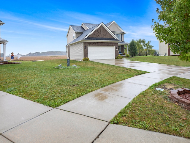 view of front of house featuring a garage and a front lawn