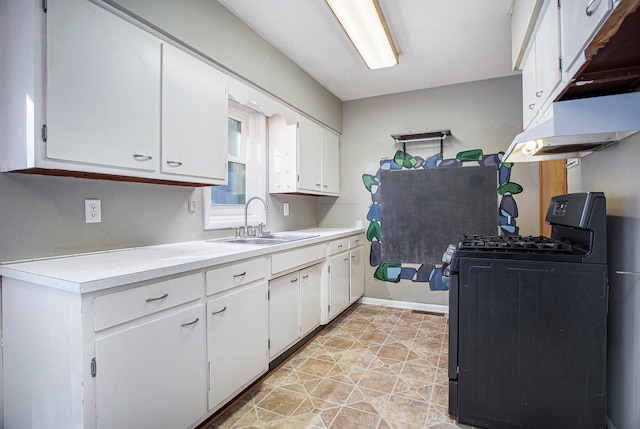 kitchen with sink, white cabinets, and black range with gas cooktop