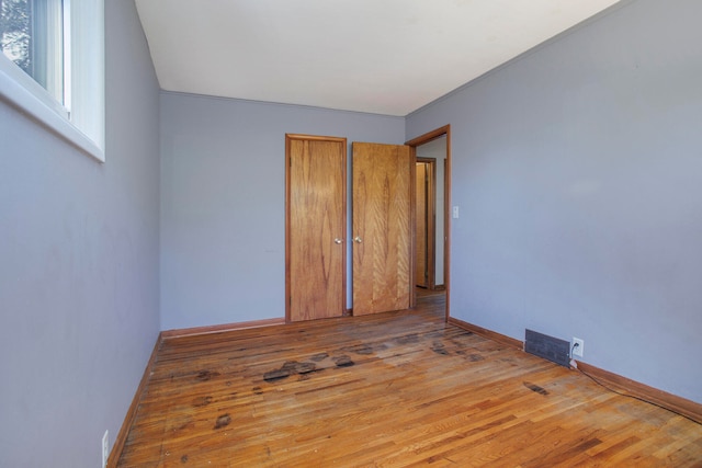 unfurnished bedroom with light hardwood / wood-style flooring