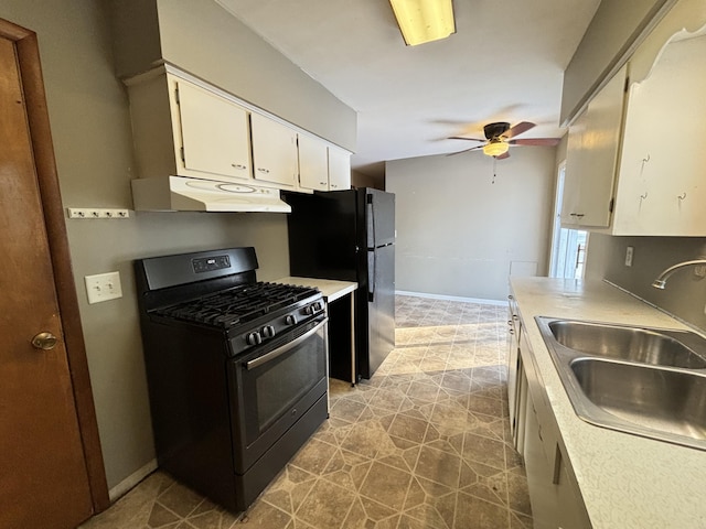 kitchen with white cabinets, ceiling fan, black appliances, and sink