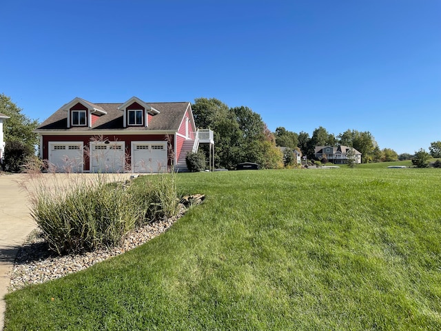 view of yard featuring a garage