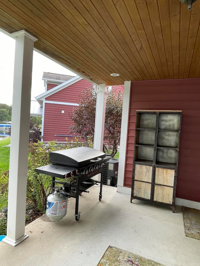 view of patio with cooling unit