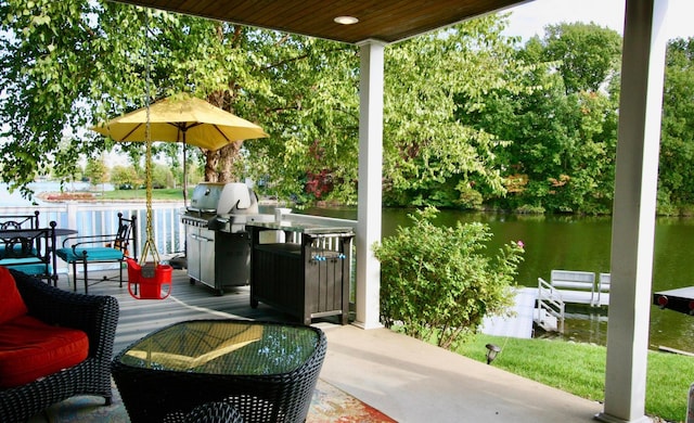 view of patio / terrace featuring a water view