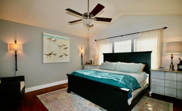 bedroom with ceiling fan, dark hardwood / wood-style floors, and vaulted ceiling