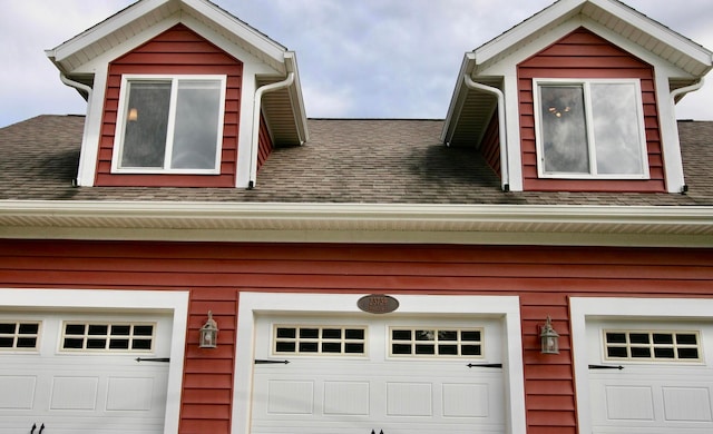 view of side of home with a garage