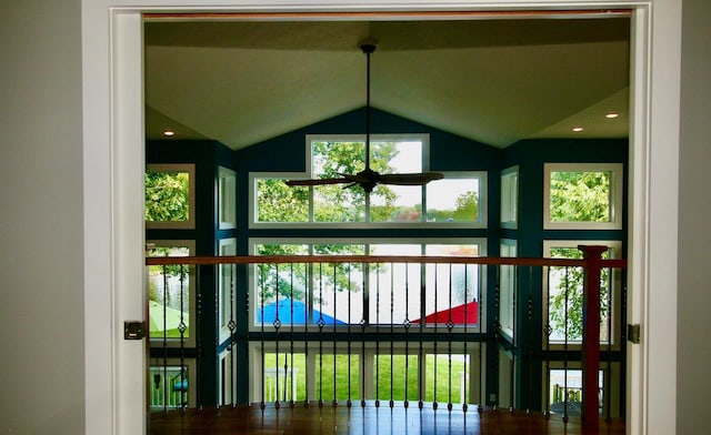 entryway with vaulted ceiling and ceiling fan