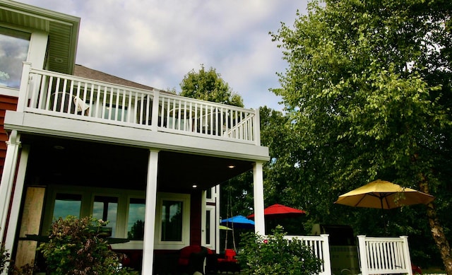 view of property exterior with a balcony