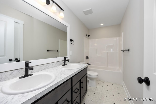 full bathroom with shower / bathing tub combination, vanity, and toilet