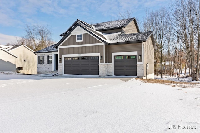 view of front of home with a garage