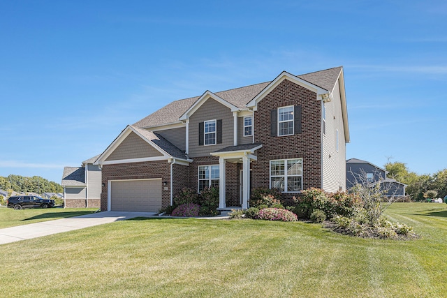 view of front of home with a front lawn and a garage