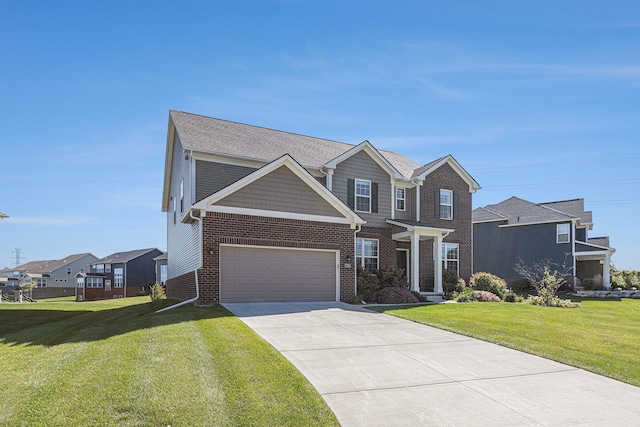 view of front of home with a garage and a front lawn