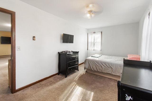 bedroom with light colored carpet