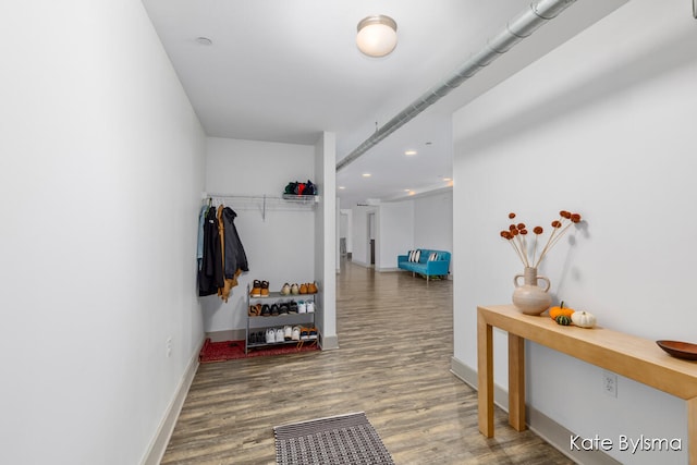 hall with dark hardwood / wood-style floors