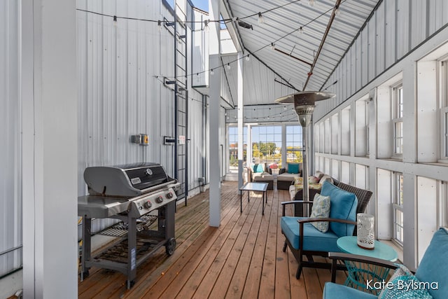 sunroom with lofted ceiling