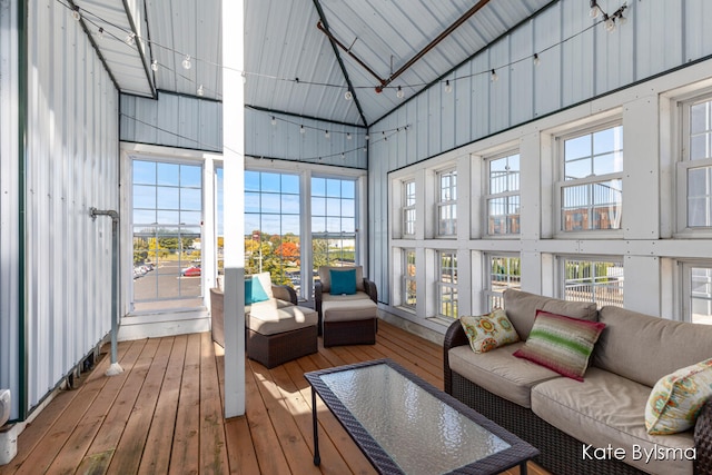 sunroom / solarium featuring wood ceiling and vaulted ceiling